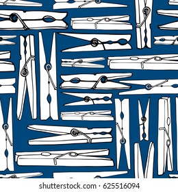 Old clothespins on a blue background. Seamless background. Pattern under the mask.