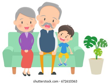 An old couple and the grandchild who sit down on a sofa