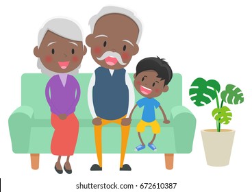 An old couple and the grandchild who sit down on a sofa