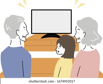 old couple and grandchild who are watching TV