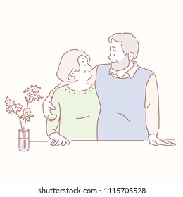 The old couple are looking at each other warmly. hand drawn style vector doodle design illustrations.