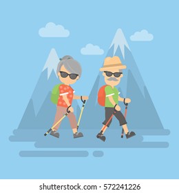 Old couple in mountains. Healthy lifestyle. Trekking for seniors.