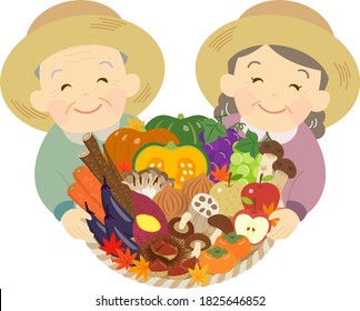 An old couple in a straw hat with autumn vegetables and fruits