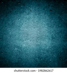 Old dark grey wall in spots, cracks, stains. Purple painted concrete wall in abstract grunge style. Grunge loft background texture for backgrounds, portraits, posters.