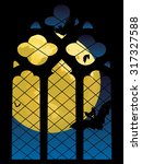 Old decorative Gothic window and big yellow moon.