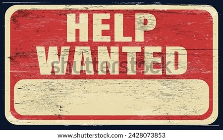 Old distressed vintage help wanted sign on wood