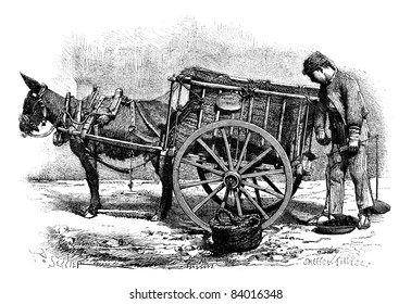 Old engraved illustration of the coal merchant drawing by Saddler- Valencia Spain. Drawing of a man with weighing scale in one hand and taking coal from the cart. Le Magasin Pittoresque - 1874.