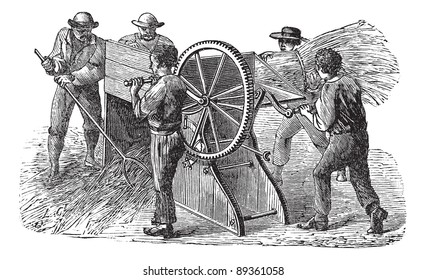 Old engraved illustration of five people using threshing machine also known as thrashing machine in the field. Industrial encyclopedia E.-O. Lami - 1875.