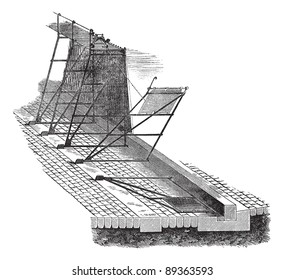Old engraved illustration of needle dam design. Industrial encyclopedia E.-O. Lami - 1875.