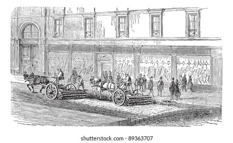 Old engraved illustration of people sweeping the street with carts, this was the way of cleaning the streets before mechanical brooms machine came. Industrial encyclopedia E.-O. Lami - 1875.