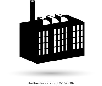 An old factory building with a chimney and a large window front
