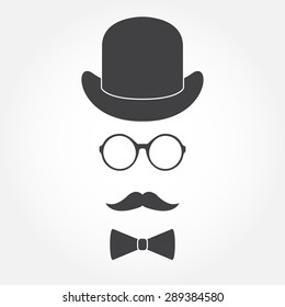 Old fashioned gentleman accessories icons set: hat, glasses, mustache and bowtie. Vintage design. Vector illustration.