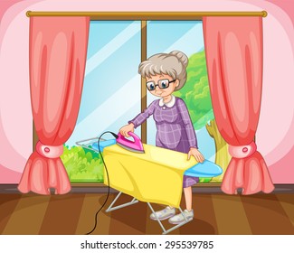 Old female standing and ironing yellow cloth in a room	