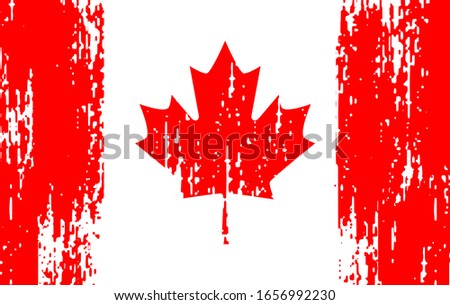 Old flag of Canada in the style of scratched paint on the wall 