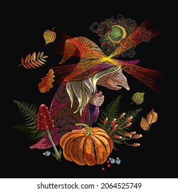 Old hag. Witch wearing hat. Halloween background. Forest sorceress, orange pumpkins, autumn leaves, moon and fly agarics. Witchcraft. Romantic dark gothic fairy tale art. Embroidery style 