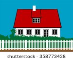 Old house and the garden behind the fence