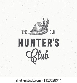 Old Hunters Club Abstract Vector Sign, Symbol or Logo Template. Tyrolean Hunter Hat with Feathers Sketch Drawing with Retro Typography and Shabby Textures. Vintage Engraving Style Emblem. Isolated.