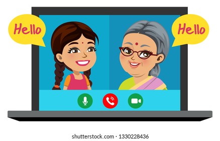 An old Indian woman is speaking on phone with her granddaughter through a video call and is very happy.