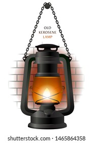 Old kerosene lamp on the brick wall fragment.