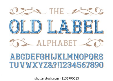 Old label alphabet. Diagonal ribbed letters and numbers with curly serifs.