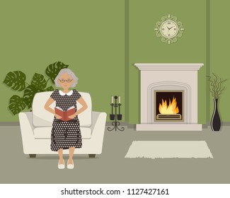 Old lady is sitting in an armchair and reading a book. There is a fireplace in the green living room. The room also has a vase with decorative branches, wall clock and big flower. Vector image