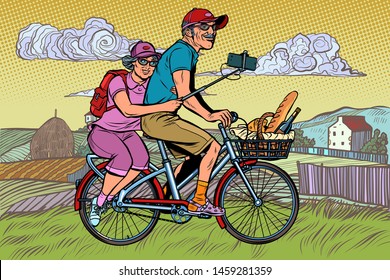 Old Man And Old Lady Travelers On Bike, Selfie On Smartphone. Pop Art Retro Vector Illustration Vintage Kitsch