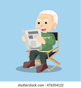 old man reading news paper