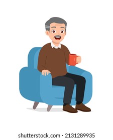 old man sit on sofa and holding cup of coffee