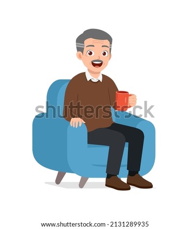 old man sit on sofa and holding cup of coffee