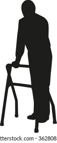 Old man walking with cane
