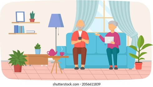 Old man and woman sitting on couch with tablet and smartphone. Senior people dealing with technology, relaxing at home. Elderly couple deal with modern gadgets, relax with computer, touchscreen phone