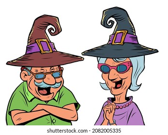 An old man and an old women couple in halloween hats laugh. love and friendship