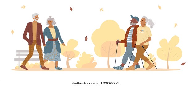 Old mature people couple walking in autumn park. Aged married man woman doing sport nordic walk. Fashion senior gentleman lady going holding hand together. Training for pensioners. Elderly recreation