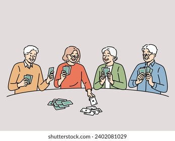 Old men and women play cards having fun after retirement and enjoying socializing with friends. Cheerful elderly people with playing cards in hands are passionate about gambling in poker club