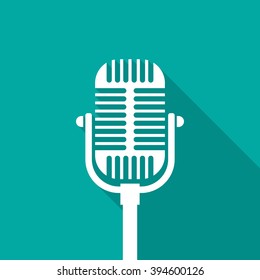 Old microphone icon with long shadow. Flat design style. Microphone silhouette. Simple green icon. Modern flat icon. Web site page and mobile app design element.