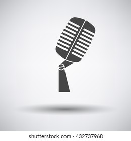 Old microphone icon on gray background with round shadow. Vector illustration.
