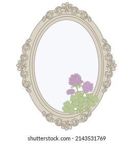 old mirror with shamrock flower
