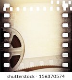 Old motion picture film reel with film strip. Vintage vector background