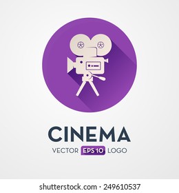 Old movie camera with reel. Flat design icon, logo. Symbol of the film production industry.