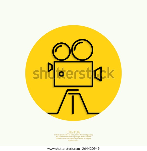 Old\
movie camera with reel on yellow background. Icon.\
