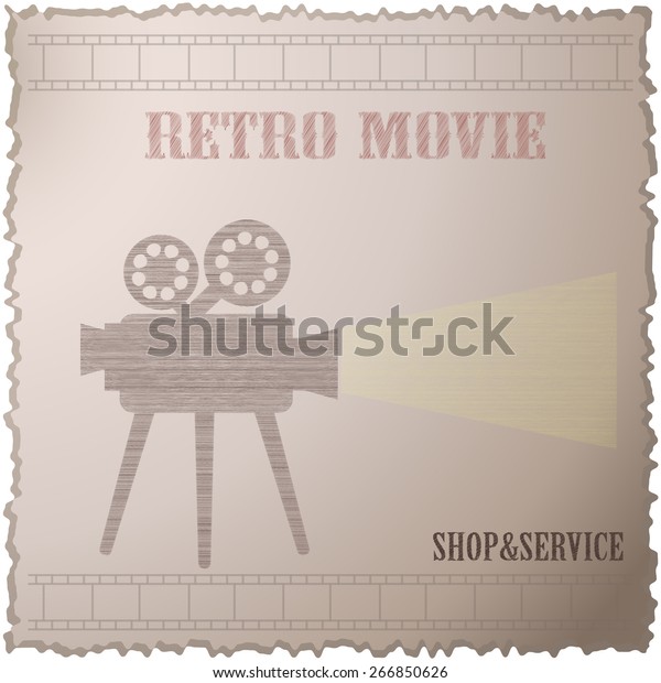 Old movie camera with reel. Symbol of the\
film industry, cinema,\
photography.