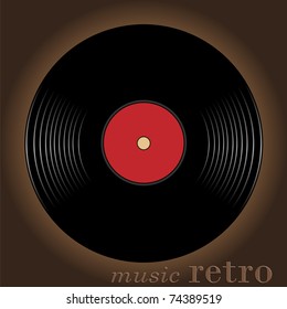 Old musical disk located against a dark background