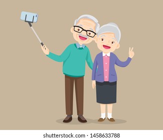 Old People Selfie. Senior People Smiley Face Smartphone Photo.Elderly Couple Making Selfie.Modern Senior Couple. 