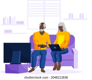 Old people with technology playing video game with gamepad and laptop entertainment for pensioner. Elderly person and modern digital device. Seniors retired grandparents play computer game at home