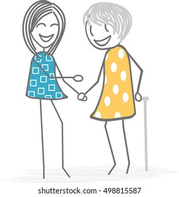 An old person is helped by someone