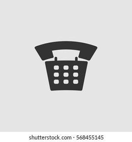 Old phone icon flat. Black pictogram on grey background. Vector illustration symbol