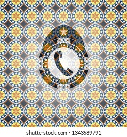old phone icon inside arabic badge. Arabesque decoration.