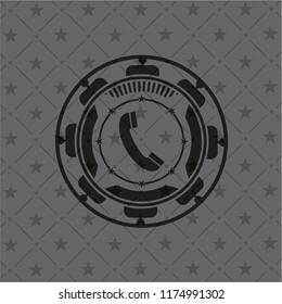 old phone icon inside dark badge or emblem