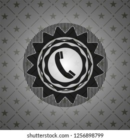 old phone icon inside dark badge or emblem