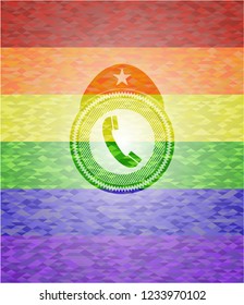 old phone icon inside emblem on mosaic background with the colors of the LGBT flag